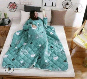 Cozy quilted lounger with sleeves in various colors and sizes, perfect for year-round indoor comfort and relaxation.