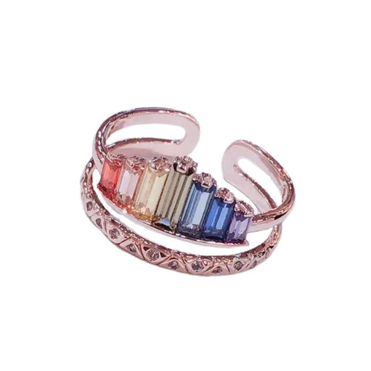 Stylish rainbow micro-diamond ring with a geometric design, available in silver and rose gold finishes
