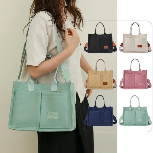 Stylish and durable canvas tote bag with multiple pockets for everyday use