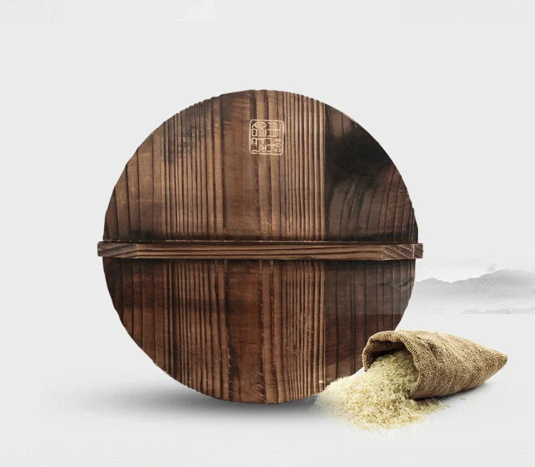 Traditional handmade iron wok with wooden handle and lid