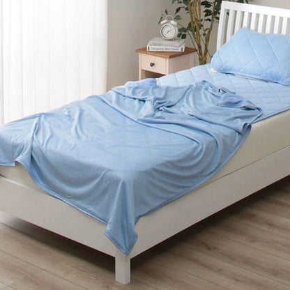 A premium polyester cooling blanket with innovative Japanese cooling fibers that provides refreshing temperature regulation for a comfortable sleep experience