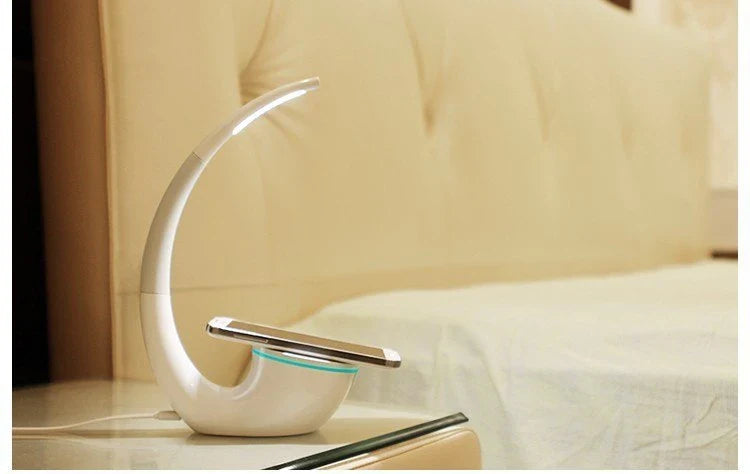 Stylish wireless charging table lamp with adjustable brightness and modern, minimalist design