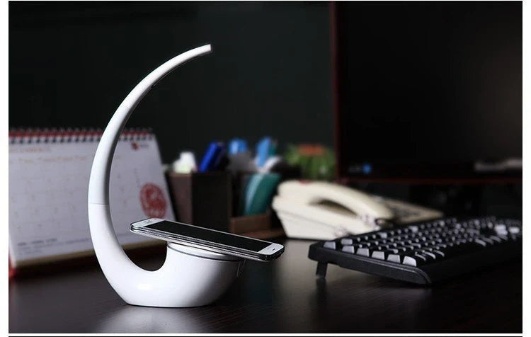 Stylish wireless charging table lamp with adjustable brightness and modern, minimalist design