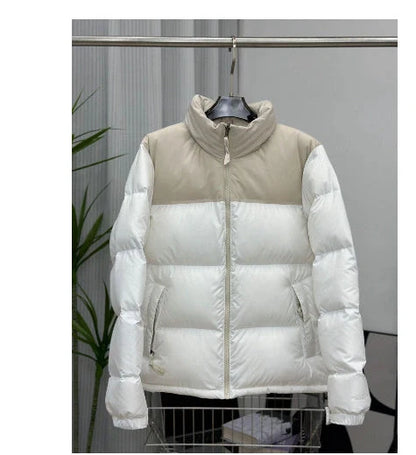 A stylish padded winter coat with contrast-coloured accents, designed for both men and women to stay warm and look fashionable.