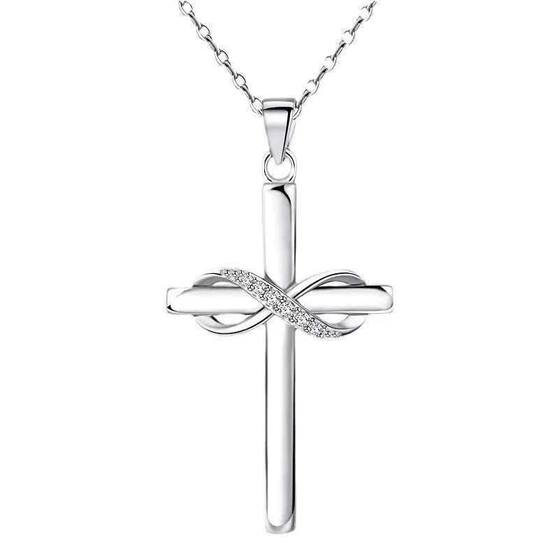 Elegant cross and infinity symbol pendant necklace in gold and silver tones, made with premium materials for a sophisticated and long-lasting accessory.