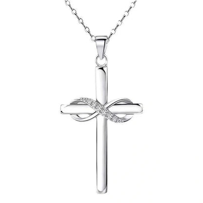Elegant cross and infinity symbol pendant necklace in gold and silver tones, made with premium materials for a sophisticated and long-lasting accessory.