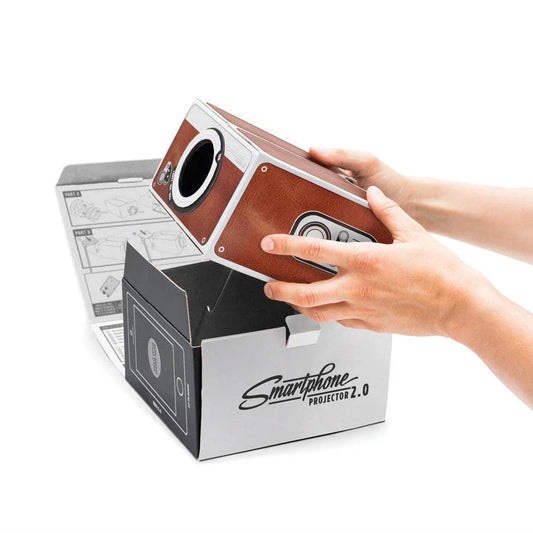 Compact cardboard phone projector for creating a miniature home cinema experience