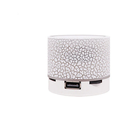 Portable Bluetooth speaker with colorful changing lights, high-quality audio, and durable design for on-the-go use