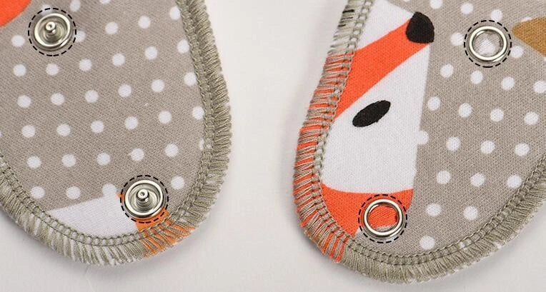 Stylish baby bibs set with arrow, wave, and triangle prints, perfect for keeping your baby clean and fashionable.