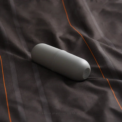 Capsule-shaped travel bottle in various colours with leak-proof design