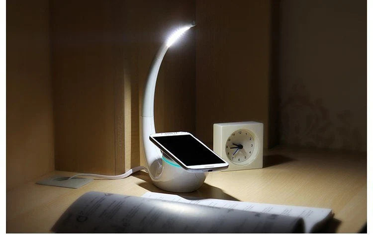 Stylish wireless charging table lamp with adjustable brightness and modern, minimalist design
