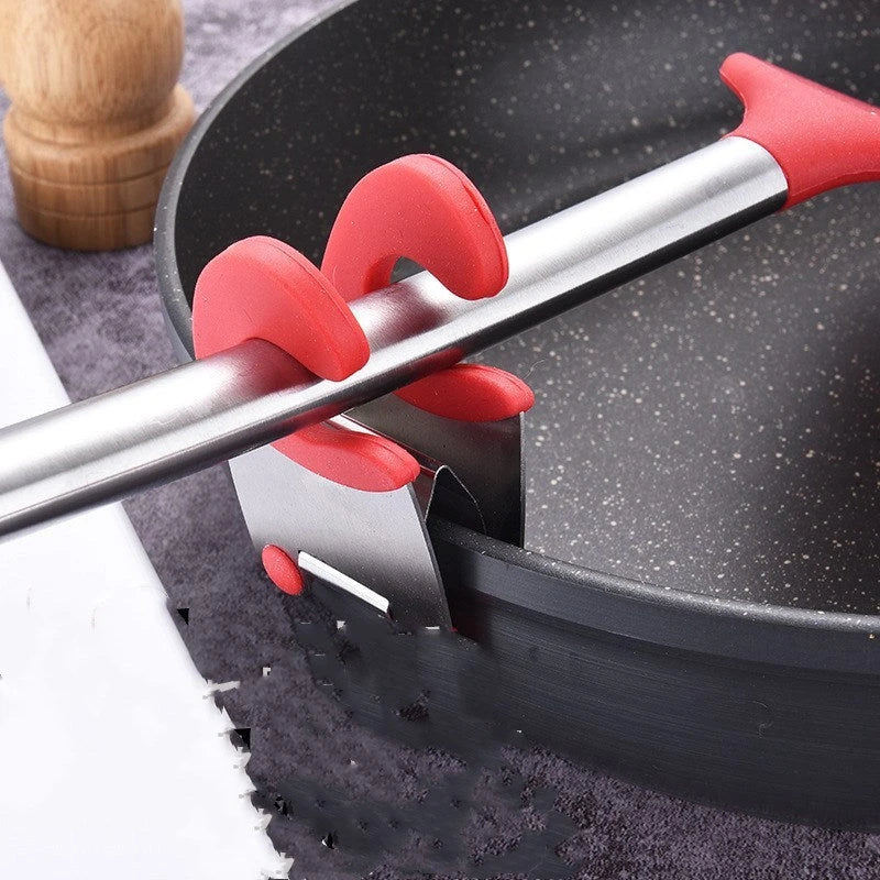 Premium stainless steel utensil holder with silicone lining and tilted design to prevent spills and keep cooking tools accessible