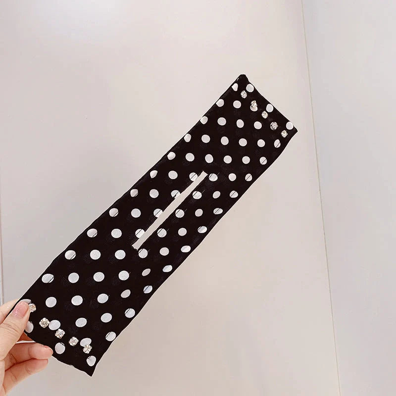 Women's elegant cloth headband with diamond and pearl accents for stylish hairstyles