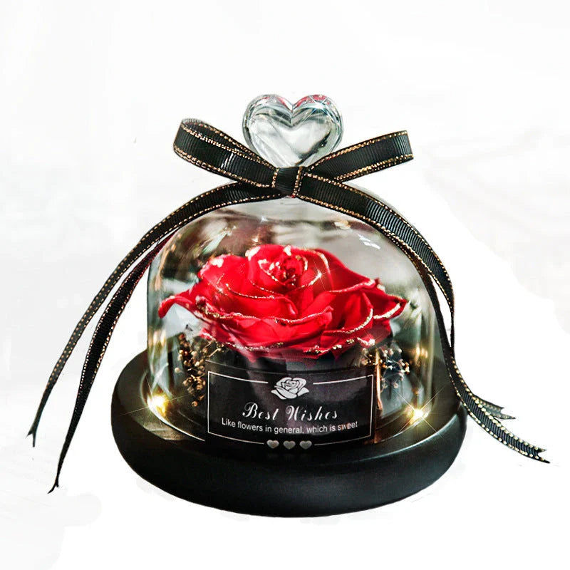 Enchanting Eternal Rose with LED lighting in a glass display, showcasing its timeless beauty and elegant design