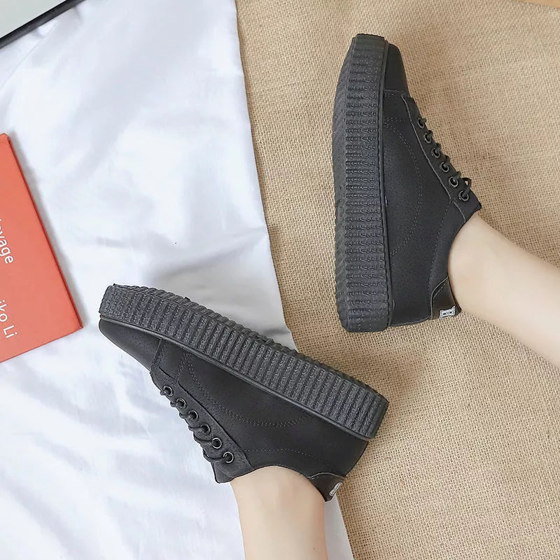 Women's black and khaki lace-up sports shoes with thick rubber sole