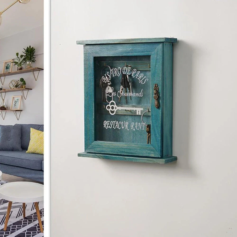 Vintage-style wooden key cabinet with six hanging hooks, offering a compact and stylish storage solution for your keys and small items.