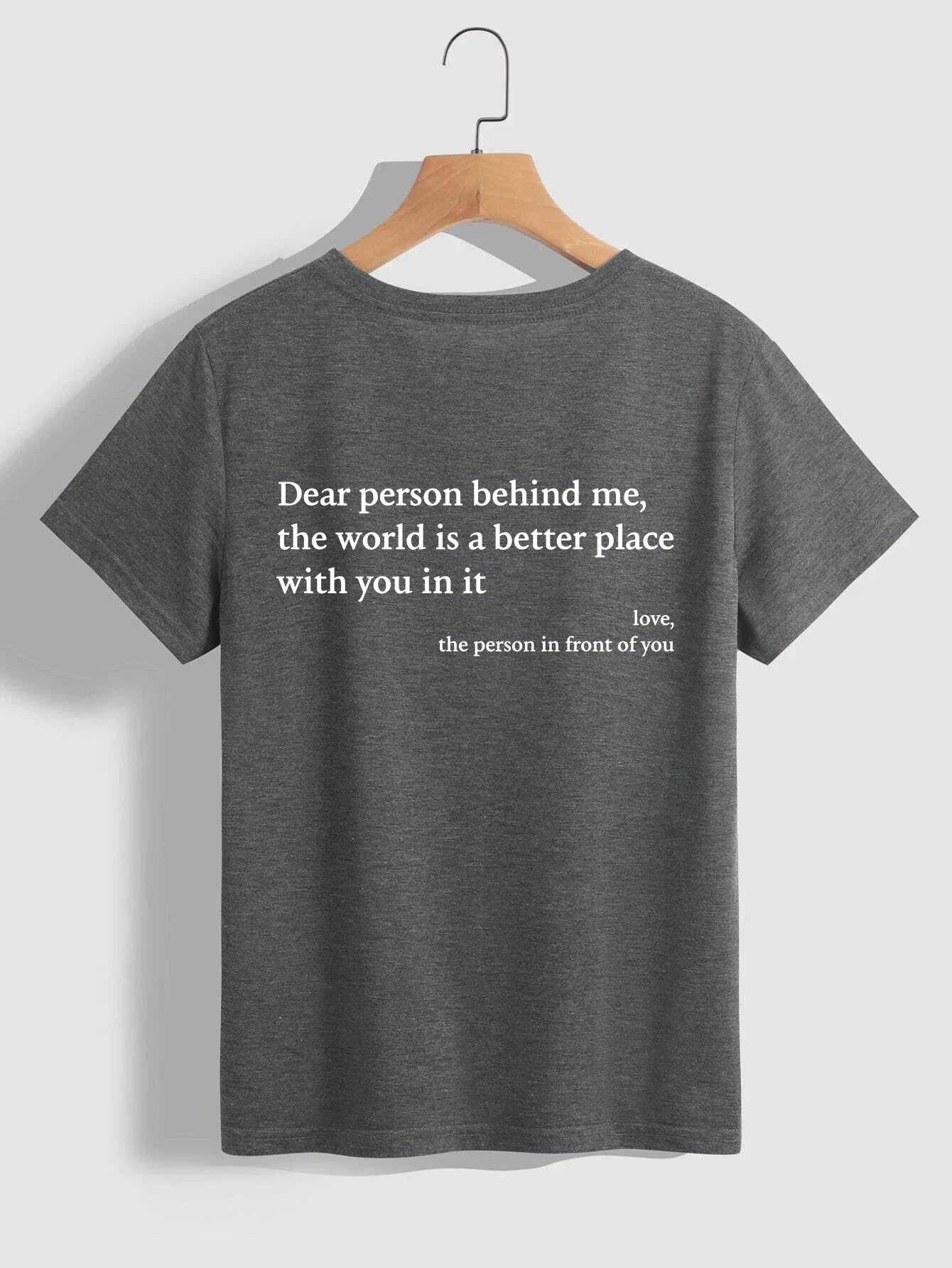 Women's graphic tee with playful slogan, available in various colors and sizes