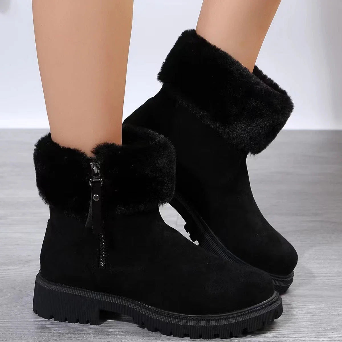 Cosy winter boots with plush lining, side zipper, and rubber soles for women in beige and black colours