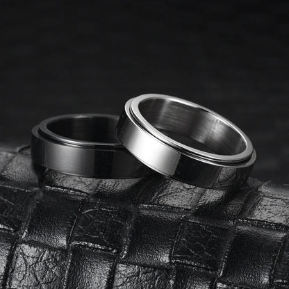 Elegant stainless steel spinner ring with a captivating moon and star design that rotates effortlessly for a calming tactile experience