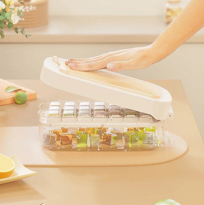 Versatile ice cube tray with high capacity, easy release, and dedicated storage compartment for included ice shovel