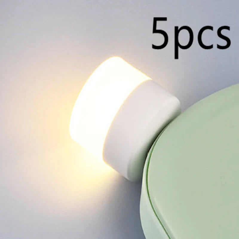 Compact USB LED night light with soft glow for reading and sleep