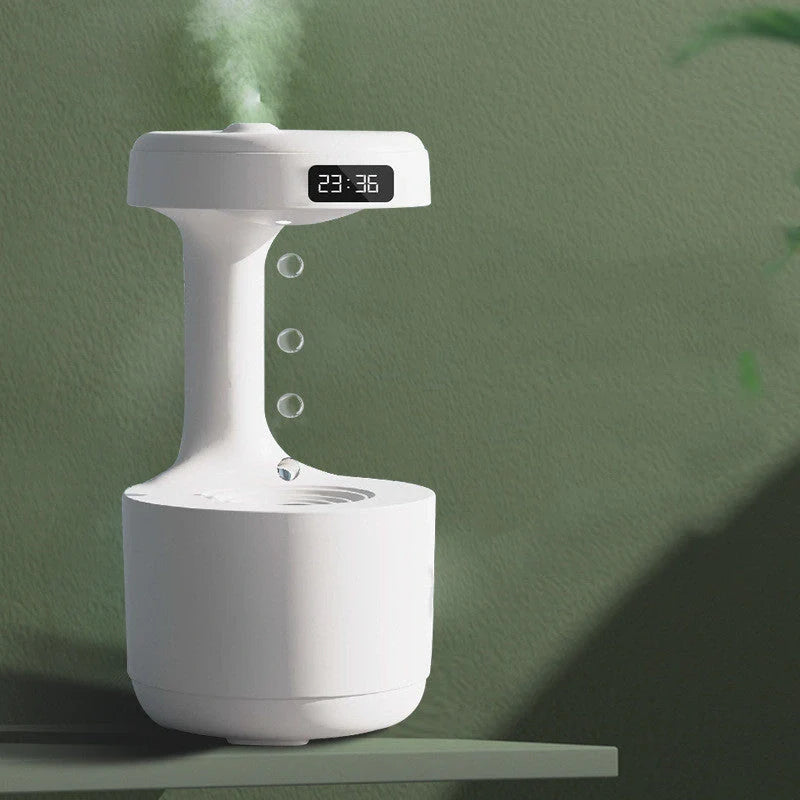 Anti-gravity humidifier with LED display and aroma diffuser in white, green, and black