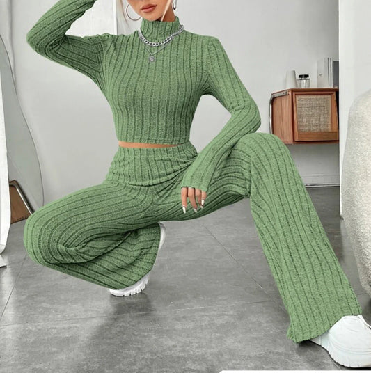 Elegant cotton turtleneck and wide-leg trousers suit in various colours, including bean green, light gray, dark red, and sapphire blue.