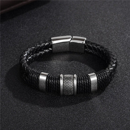Premium black braided leather bracelet with titanium and stainless steel clasp, a timeless accessory for the modern gentleman