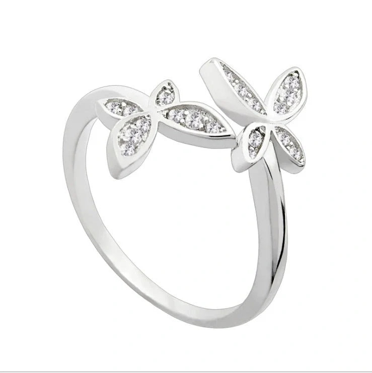 Sterling Silver Adjustable Butterfly Ring with gem accents on a white background