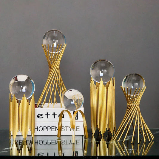 Elegant crystal ball home decor ornaments with a luxurious golden metal finish and minimalist modern design