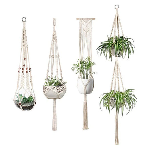 Handmade bohemian macrame hanging plant baskets in a set of four, perfect for home decor.