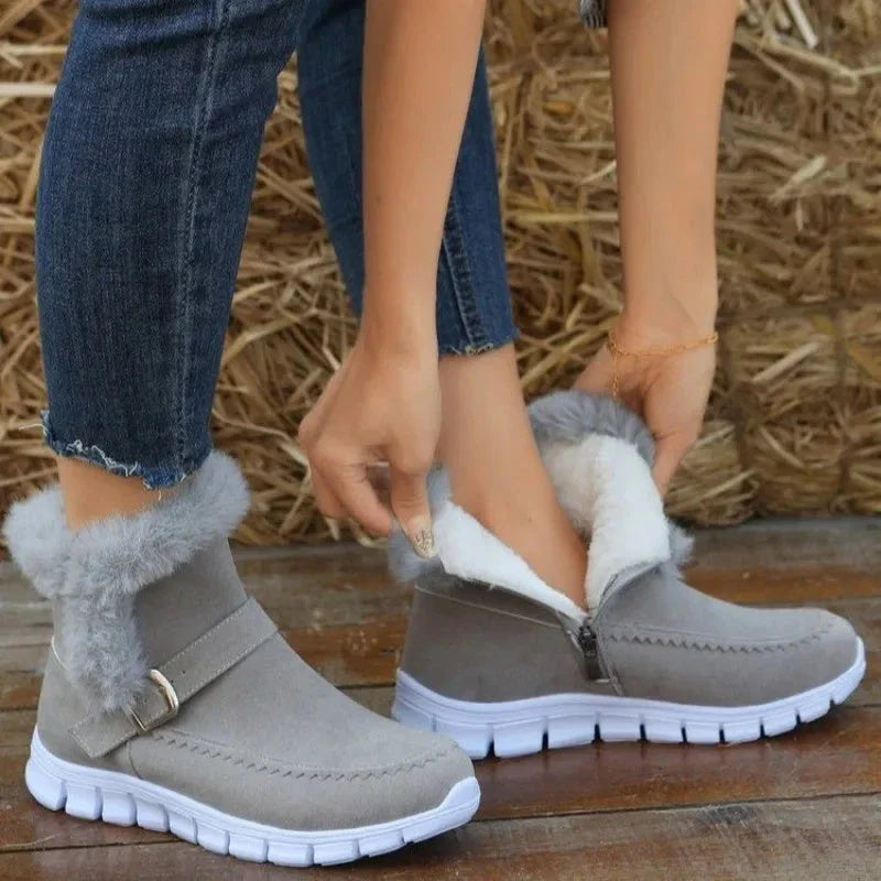 Cozy plush ankle boots in various colors with buckle detail and soft artificial fur lining