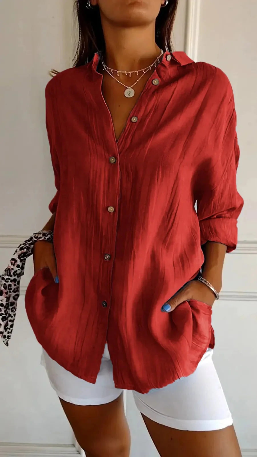 A stylish long-sleeved shirt with a pleated design, available in a variety of colours to suit any occasion.