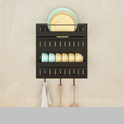 A high-quality stainless steel wall-mounted kitchen storage rack with a perforated design for customisable storage