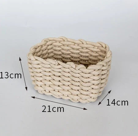 Hand-woven cotton rope storage basket in grey and white colours, featuring a minimalist nordic design for practical and stylish home organisation