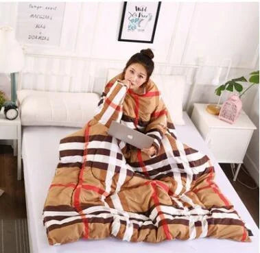 Cozy quilted lounger with sleeves in various colors and sizes, perfect for year-round indoor comfort and relaxation.