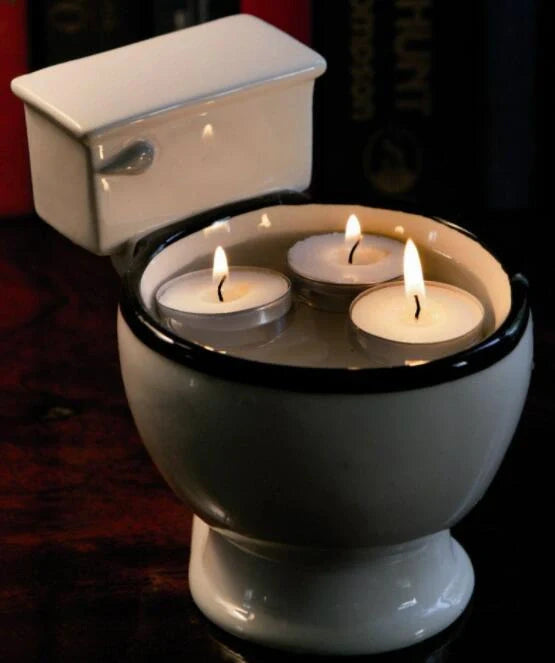 Toilet-shaped ceramic mug with handgrip, perfect for coffee or tea, holding 280ml.