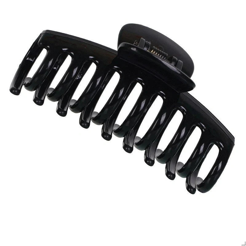 Candy-coloured plastic ponytail clip for showers and daily hair styling