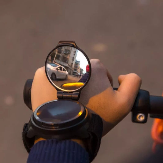 Wrist riding rear view mirror with 360° rotation and anti-slip mat for cyclists