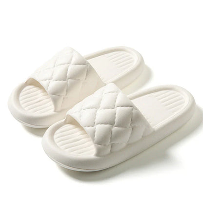 Comfortable and lightweight home slippers with a unique rhombus pattern, waterproof and odor-resistant EVA material, and a non-slip sole for safe indoor wear.