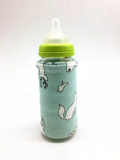 USB-powered baby bottle warmer and insulated travel bag for keeping milk warm on the go