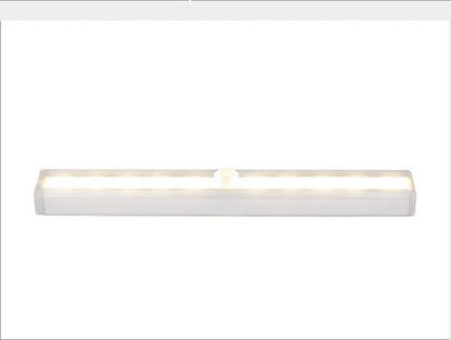 Sleek motion-activated LED cabinet light with infrared sensor for hands-free, energy-efficient illumination