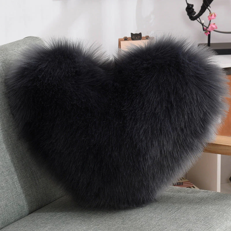 Cozy heart-shaped throw pillow with plush, shaggy texture in various colors