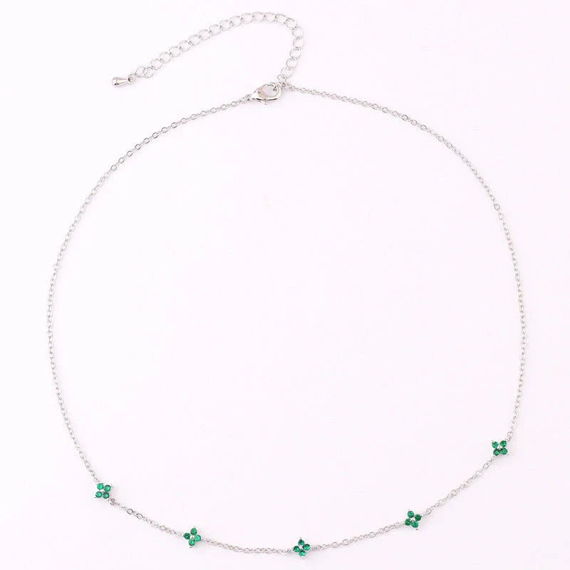 Elegant floral statement necklace in various color options, including golden blue, silver blue, golden green, and silver green, with an adjustable chain and high-quality construction.