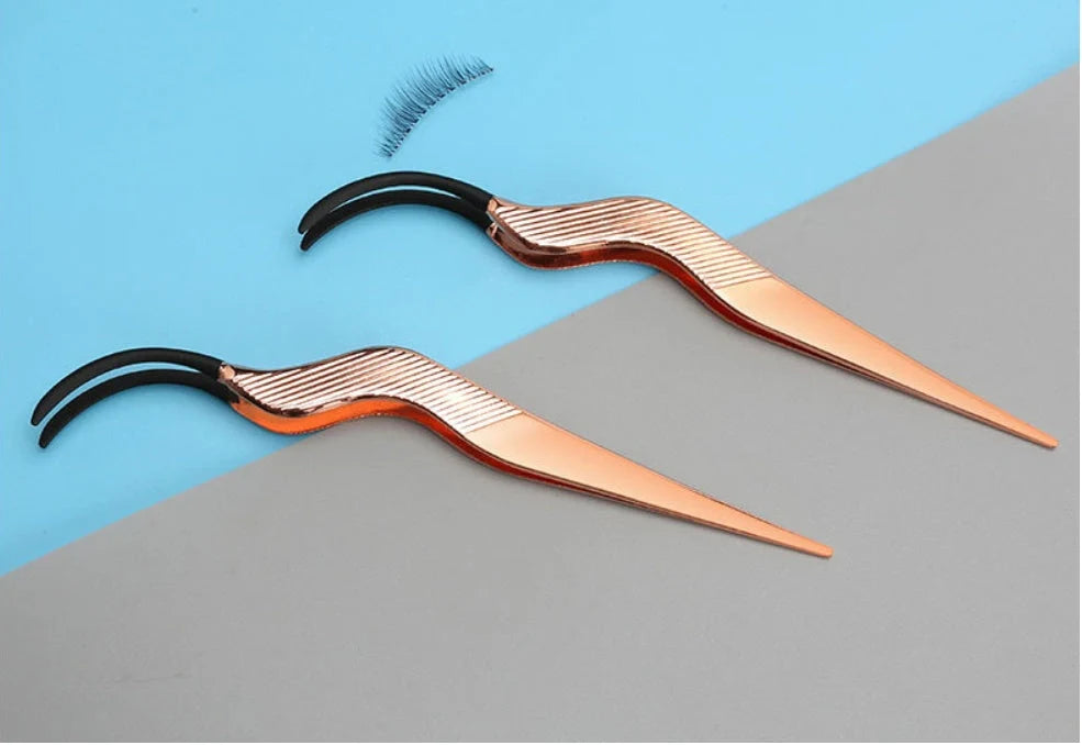 Rose gold false eyelash curler aid for flawless, curled lashes