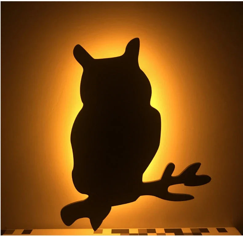 A stylish cat-shaped smart sensor night light that automatically illuminates a room when motion is detected, creating a warm and cozy atmosphere.