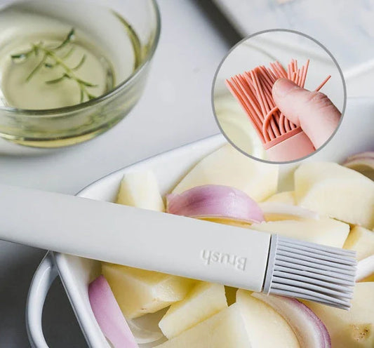 Premium silicone basting brush with sturdy, non-slip handle and flexible head for even distribution of sauces, oils, and glazes on meats, baked goods, and more.