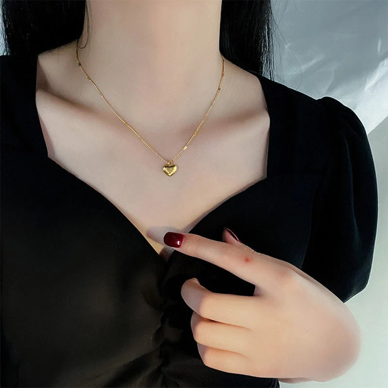 Vintage gold titanium steel heart pendant necklace with sectional chain