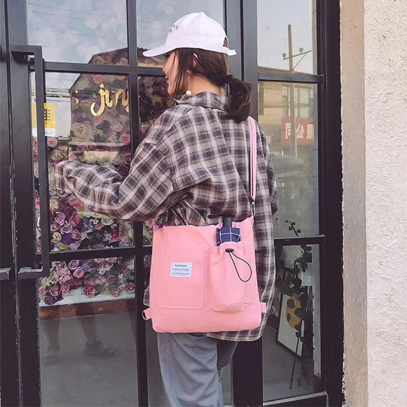 Stylish Harajuku-inspired canvas backpack with zipper closure, adjustable straps, and vibrant color options for students and women