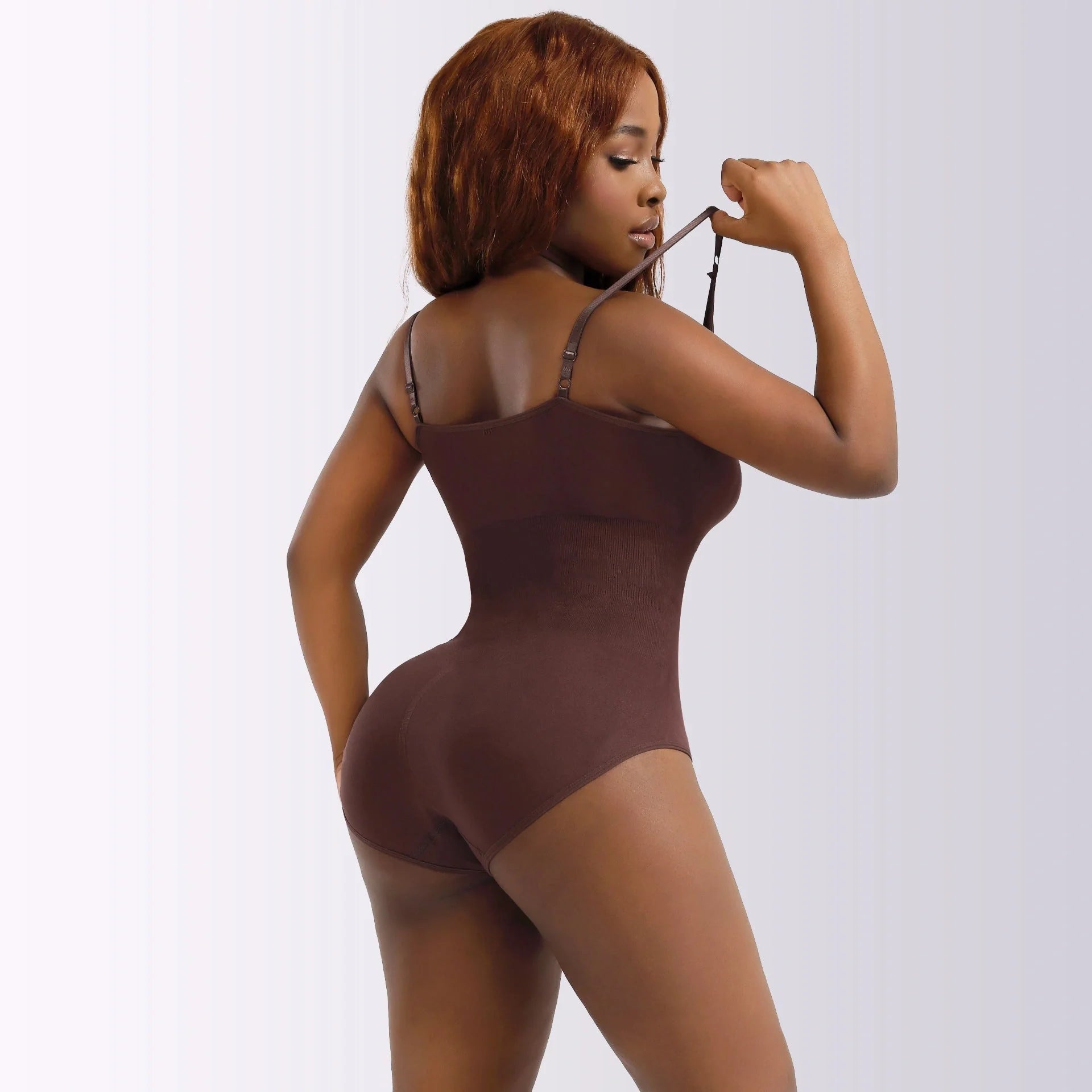 Premium nylon slimming corset in various colours and sizes, designed to sculpt and slim the figure for a flattering, hourglass shape.